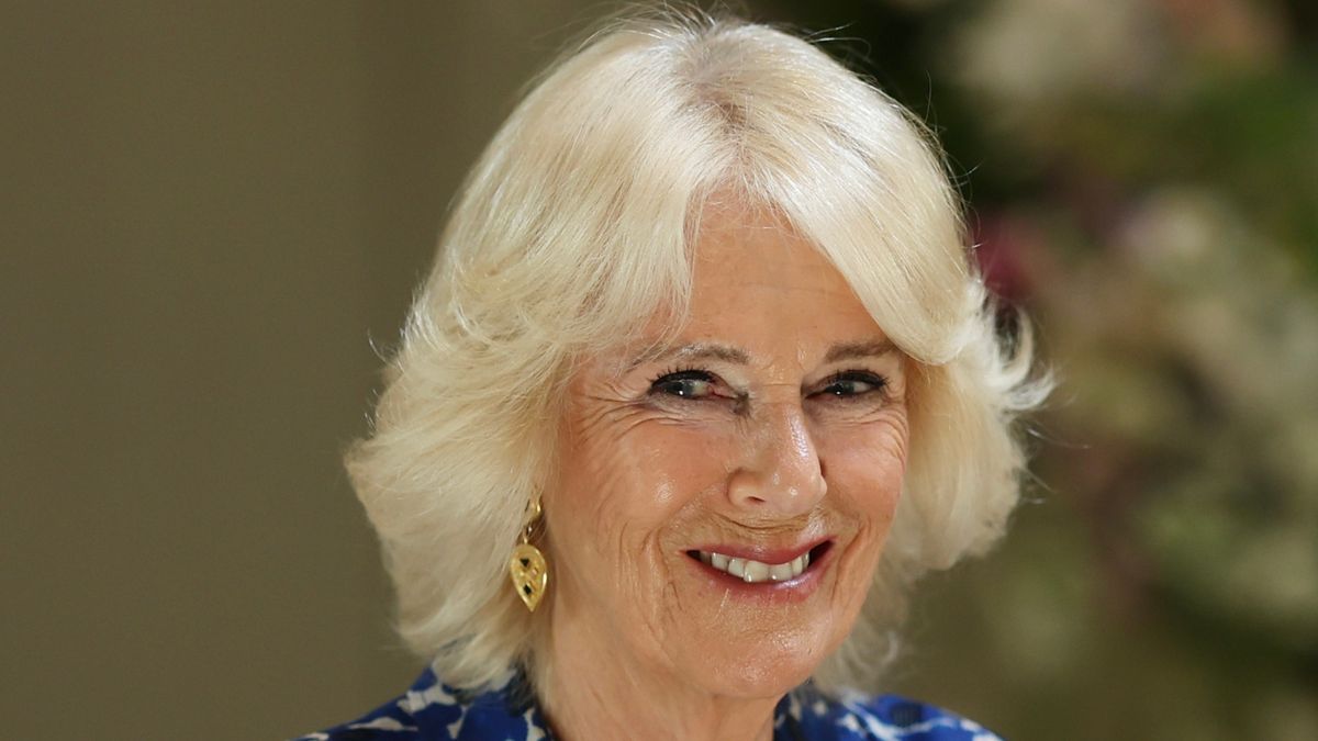Queen Camilla’s cornflower blue tunic dress with bishop sleeves showcases Queen Elizabeth’s ultimate style ethos