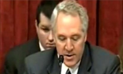 Rep. John Shimkus (R-Ill.) reads a few verses from Genesis 8 and Matthew 24 in the Bible to underscore his conviction that man will not destroy the earth.