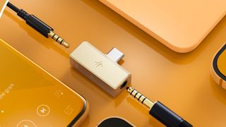 Product photography of the FiiO Snowsky Tiny headphone DAC