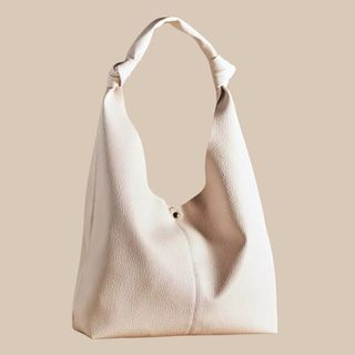 flat lay image of leather tote bag