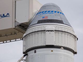 Boeing’s CST-100 Starliner spacecraft sits atop a United Launch Alliance Atlas V rocket at Cape Canaveral Space Force Station in Florida ahead of the planned launch of its Orbital Flight Test 2 mission to the International Space Station. That launch was scheduled to occur on Aug. 3, 2021, but issues with valves in Starliner’s service module have pushed it to May 19, 2022.