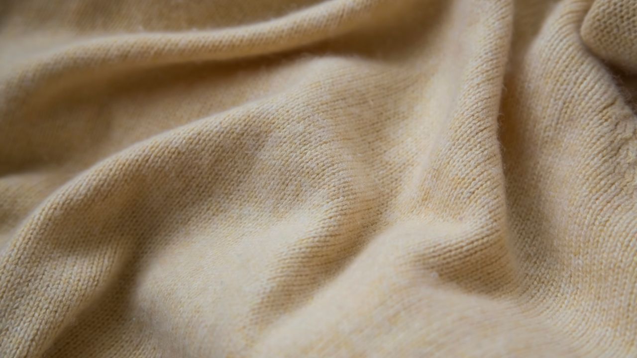 Close up of beige cashmere material