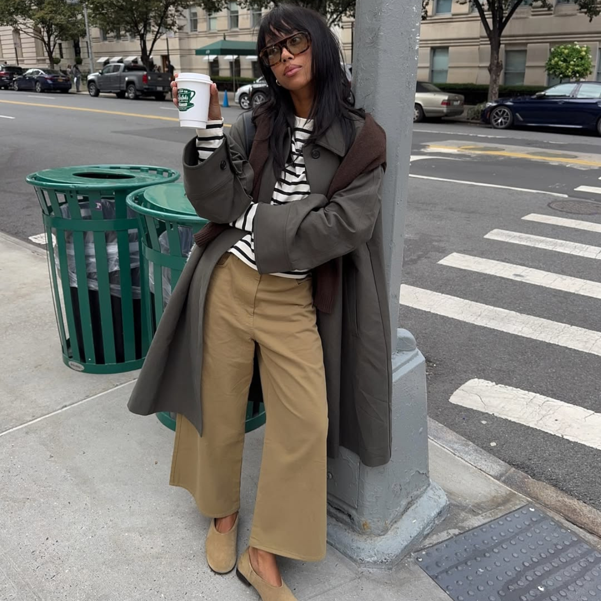 Influencer Amaka Hamelijnck wearing cropped wide-leg trousers and ballet flats. 