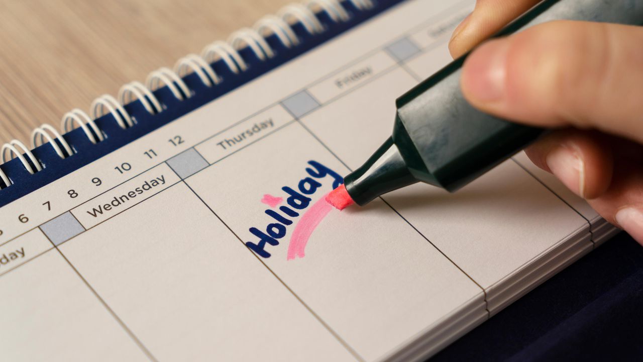 A calendar with the word &amp;quot;Holiday&amp;quot; underlined in highlighter.