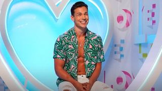 Andy smiling as a contestant of Love Island USA season 4