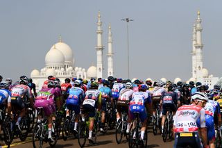 ABU DHABI UNITED ARAB EMIRATES FEBRUARY 21 A general view of the peloton passing through Sheikh Zayed Mosque landscape during the 4th UAE Tour 2022 Stage 2 a 176km stage from Hudayriyat Island to Abu Dhabi Breakwater UAETour WorldTour on February 21 2022 in Abu Dhabi United Arab Emirates Photo by Tim de WaeleGetty Images
