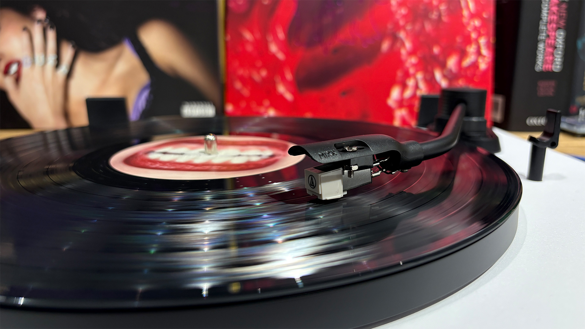 Mixx Analog+ turntable/CD player close up playing vinyl record