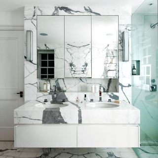 Bathroom with wash basin white and grey marble