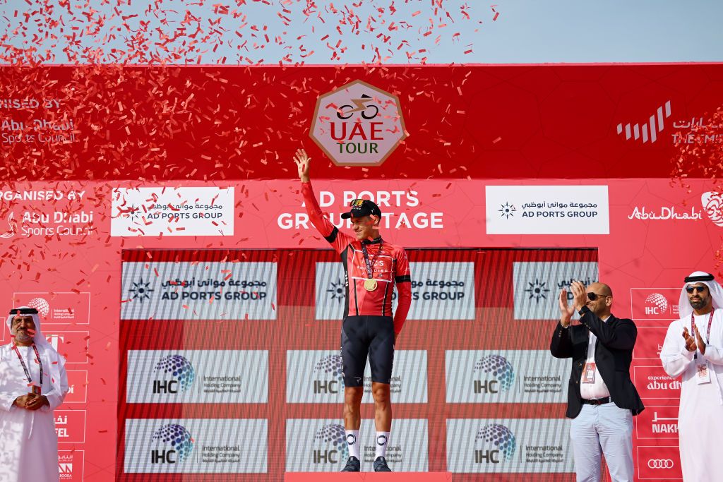 KHALIFA PORT UNITED ARAB EMIRATES FEBRUARY 21 Lucas Plapp of Australia and Team INEOS Grenadiers celebrates at podium as Red Leader Jersey winner during the 5th UAE Tour 2023 Stage 2 a 173km team time trial in Khalifa Port UAETour on February 21 2023 in Khalifa Port United Arab Emirates Photo by Dario BelingheriGetty Images