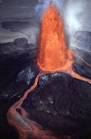 Volcanoes play a vital role on Earth, regulating the long-term climate and nourishing surrounding soils. This particular volcano is the Pu'u 'O'o—Kupaianaha Eruption on 28 July 1984.