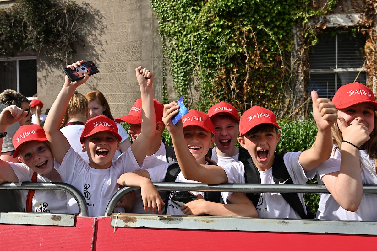 Picture by Will PalmerSWpixcom 05092022 Cycling 2022 AJ Bell Tour of Britain Stage 2 Hawick to Duns Scotland School children await the finish in Duns wear the AJBell Caps