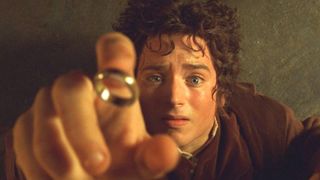 Elijah Wood as Frodo Baggins reaching out for the One Ring during The Lord of the Rings: The Fellowship of the Ring.