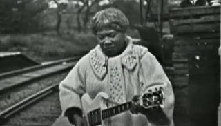 Sister Rosetta Tharpe performs at Wilbraham Road train station in 1964