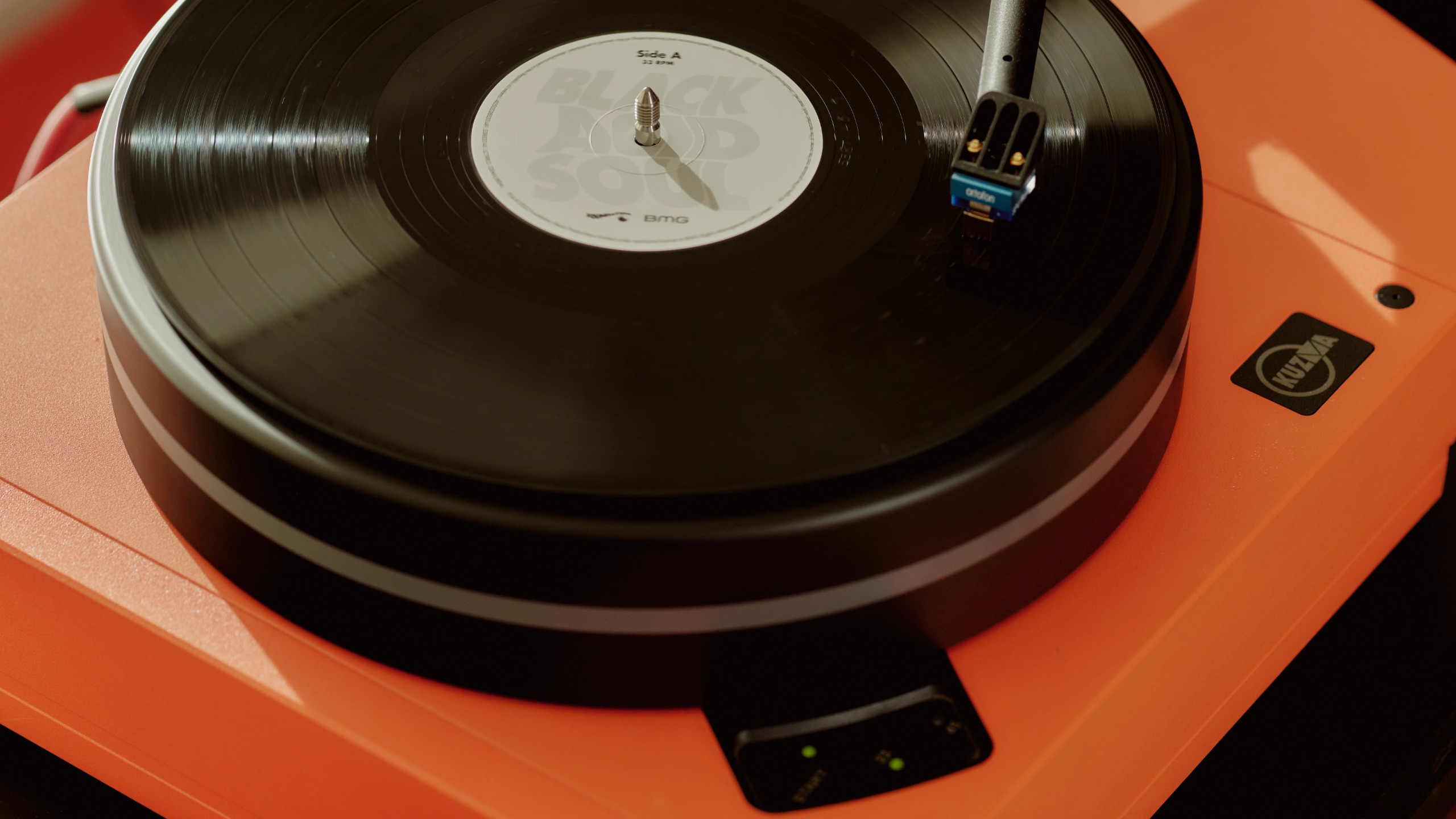 Kuzma record player in orange