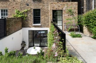 exterior view of a house with a basement 