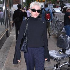 Emma Chamberlain wears Tabi flats.