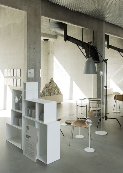 Two images: Left shaped wire, wooden peg-like shapes and cardboard cylinder arranged artistically, Right: A chair for safari with a foam seat