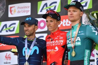 HUY BELGIUM APRIL 20 LR Alejandro Valverde Belmonte of Spain and Movistar Team on second place race winner Dylan Teuns of Belgium and Team Bahrain Victorious and Aleksander Vlasov of Russia and Team Bora Hansgrohe on third place pose on the podium ceremony after the 86th La Flche Wallonne 2022 Mens Elite a 2011km one day race from Blegny to Mur de Huy 204m WorldTour FlecheWallonne on April 20 2022 in Huy Belgium Photo by Luc ClaessenGetty Images