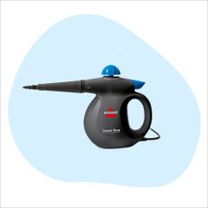 a bissell steamshot steam cleaner on a blue and white graphic background