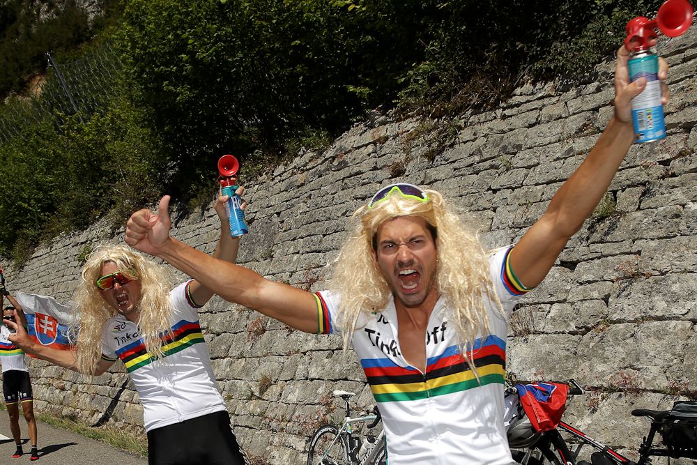 Peter Sagan impersonators wait for the Tour de France to come by.
