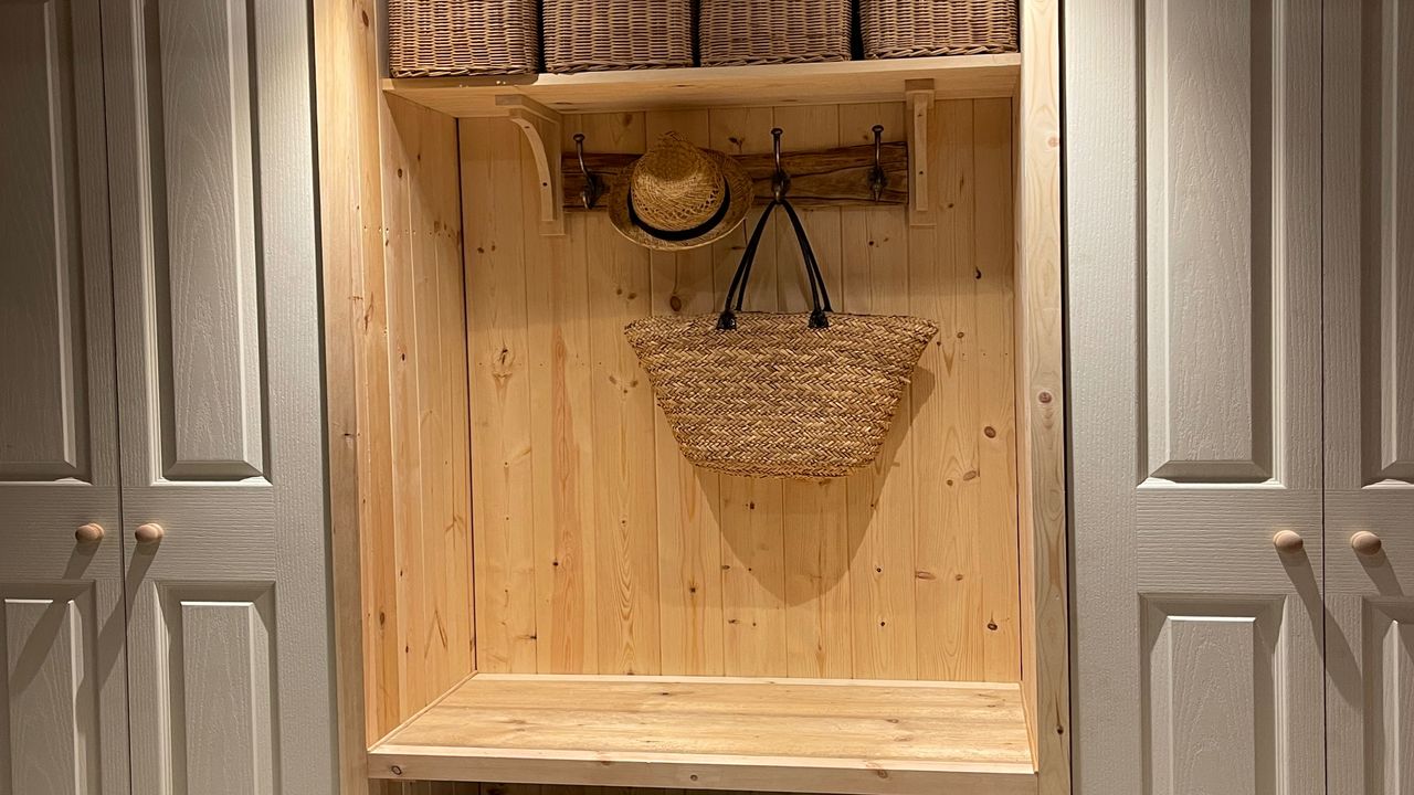 fitted hallway storage with hooks and bench