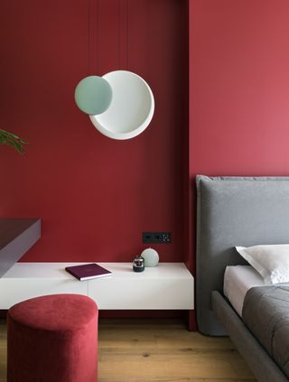 A red and grey bedroom