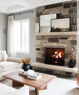 gray living room with fireplace