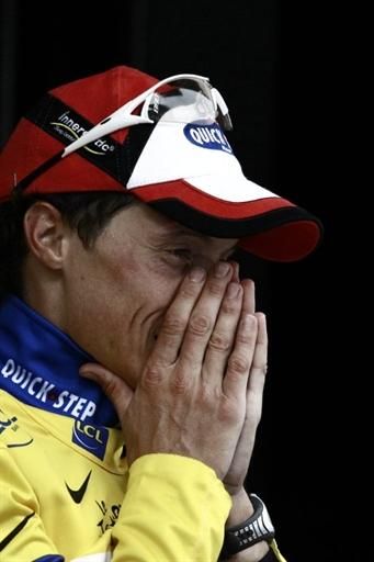 Sylvain Chavanel (Quick Step) reacts to his time on the yellow jersey podium.