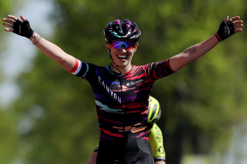 A joyous Niewiadoma crosses the line