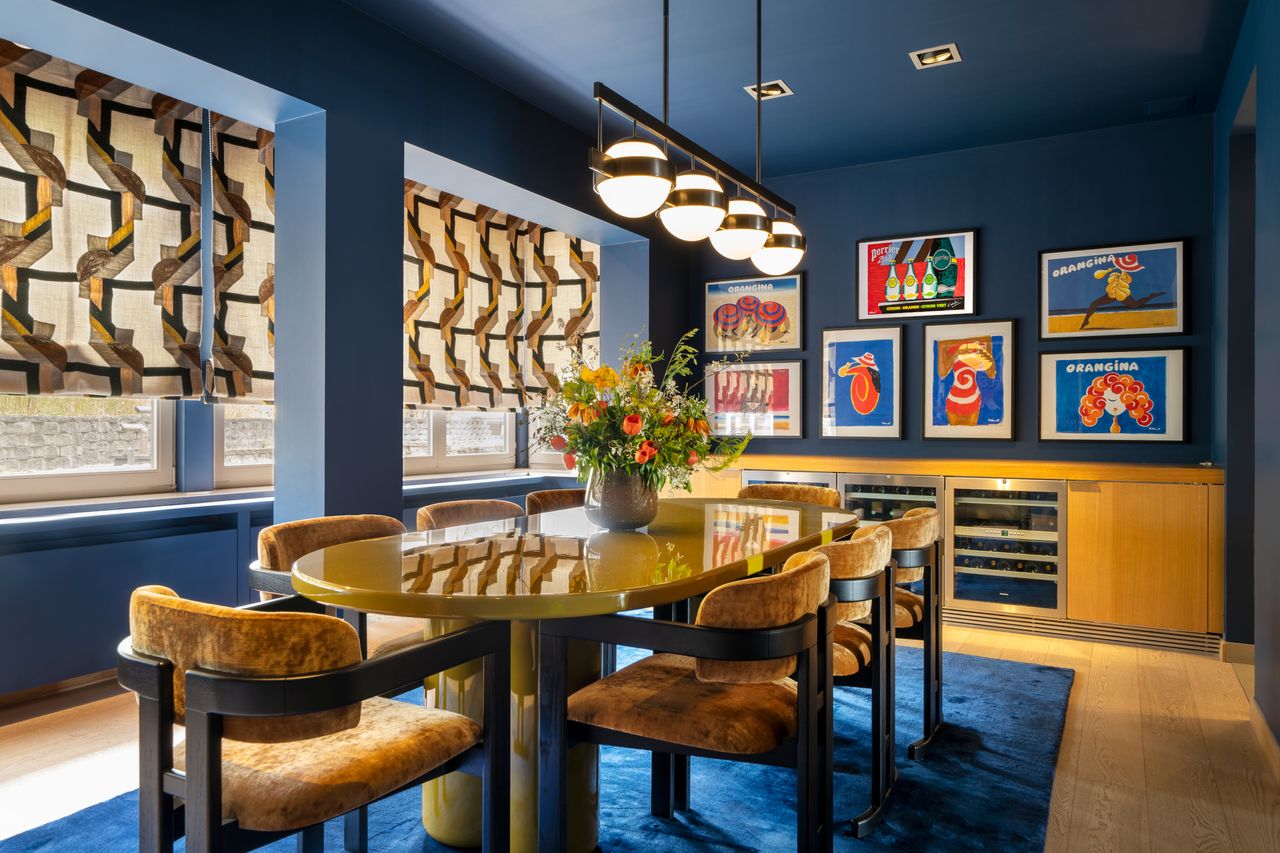 Paint finish in blue on ceilings and walls of dining room