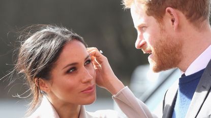 Nose, Forehead, Gesture, Formal wear, Neck, Ear, Event, Ceremony, 