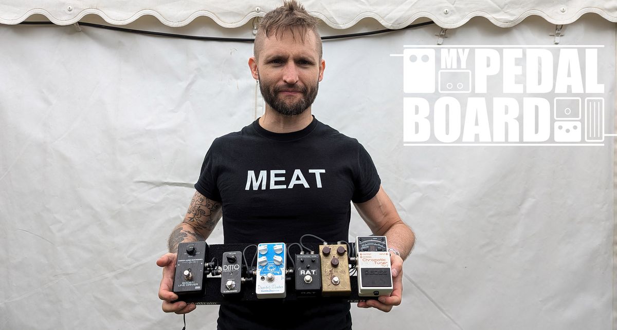 Jesse Matthewson of KEN mode shows off his pedalboard backstage at ArcTanGent Festival 2024