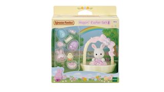 The Sylvanian Families Hoppin' Easter gift set which features a white rabbit figure in an Easter basket with Easter accessories