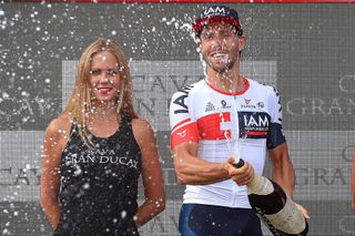 Jonas van Genechten (IAM Cycling) on the stage 7 podium at the Vuelta
