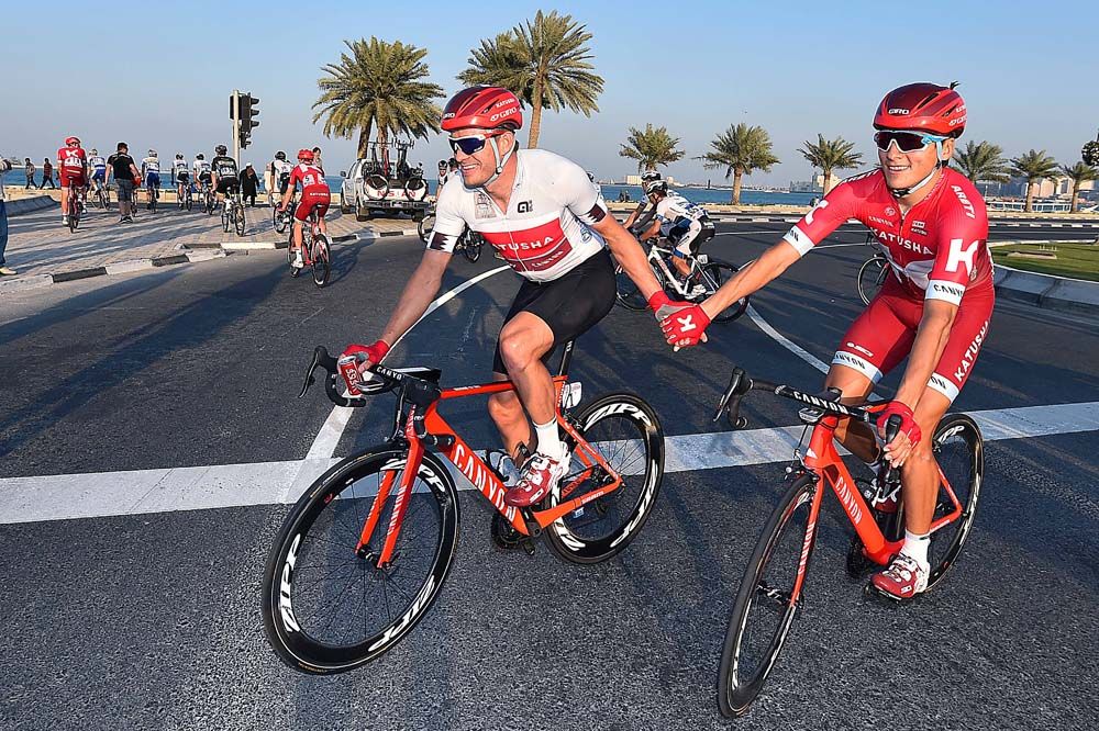 Alexander Kristof celebrates with his Katusha teammates