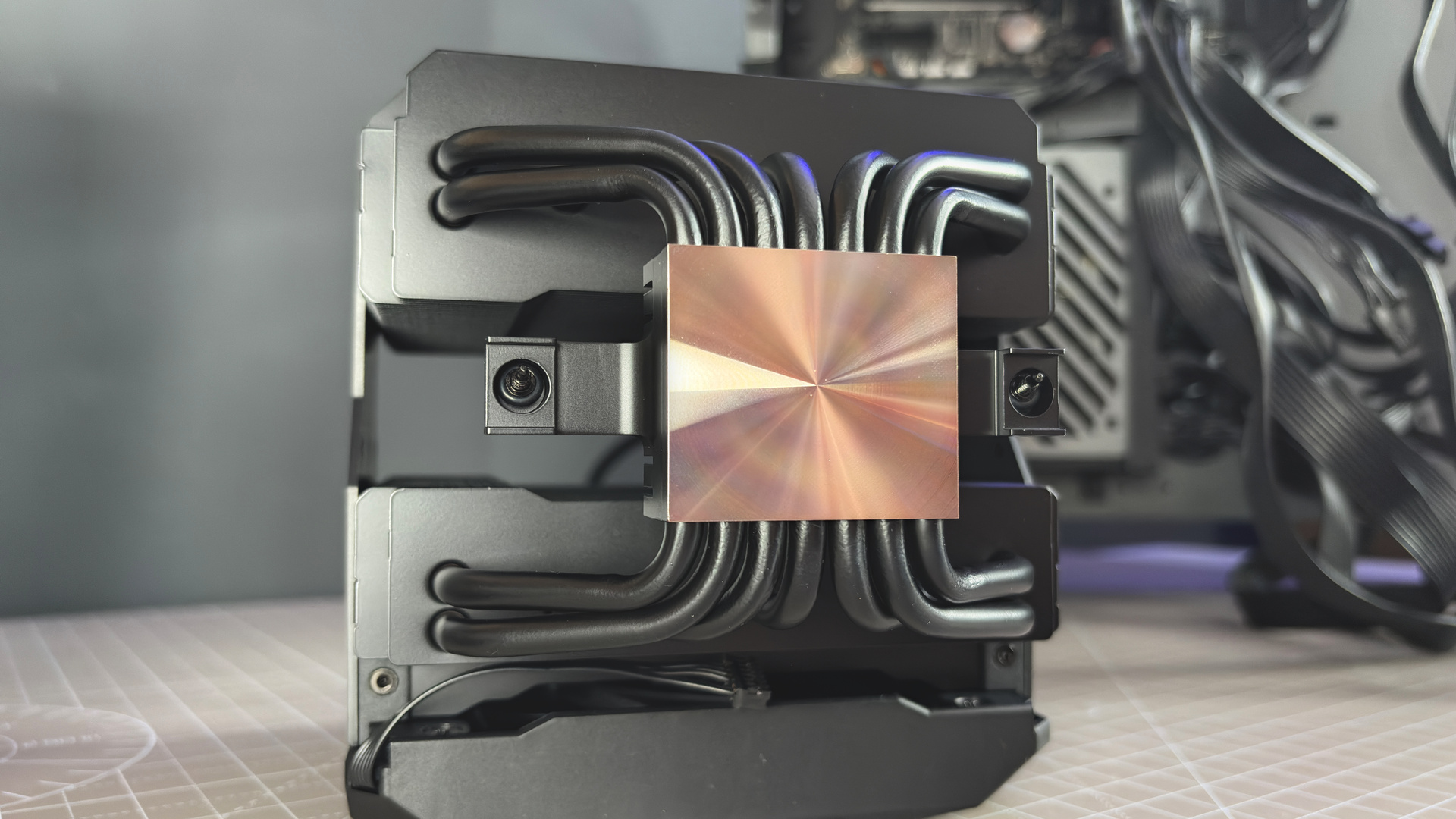 Be Quiet's latest air coolers on a box with black fans.