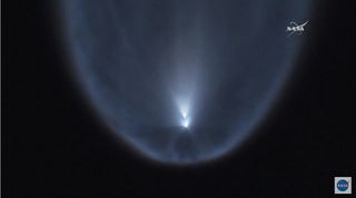 SpaceX's predawn launch of a used Falcon 9 rocket and Dragon on June 29, 2018 created dazzling views from the ground like this one, captured during stage separation.