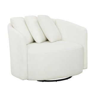 A large white boucle chair