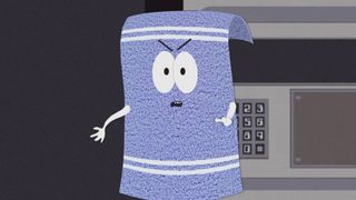 Towelie looking angry while standing in front of a keypad