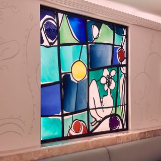 Stained glass windows at Claridge’s Painter's Room bar