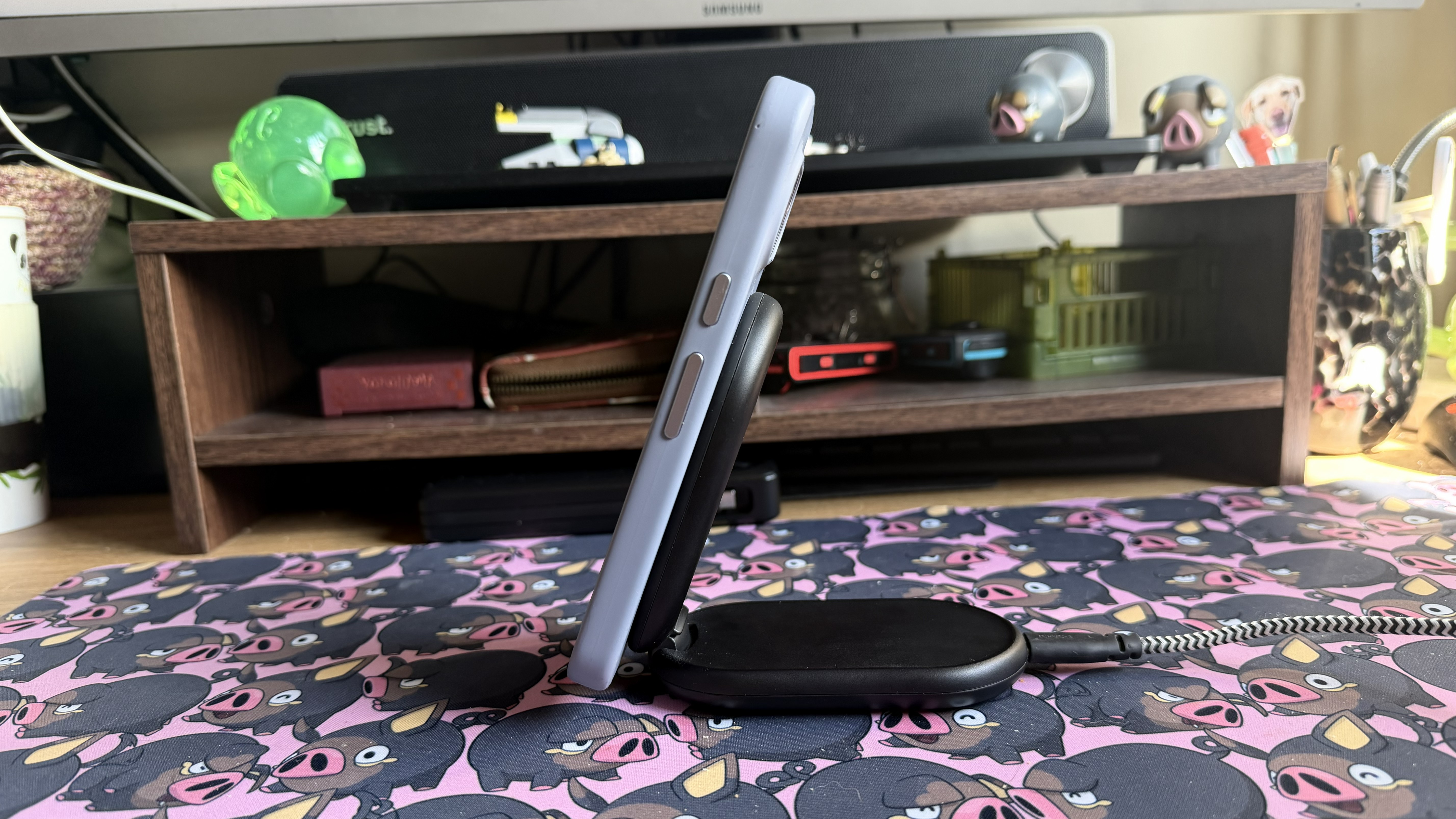 Belkin BoostCharge Magnetic Foldable Wireless Charging Stand with phones attached