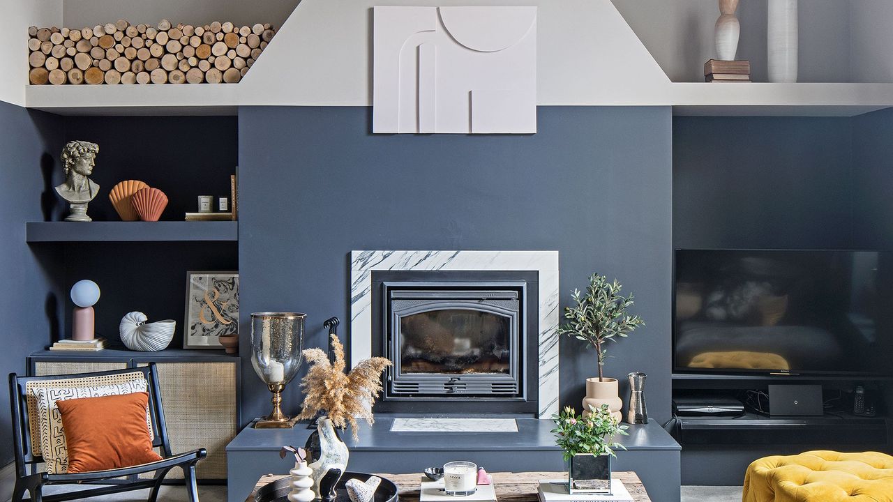 living room with fireplace and shelves