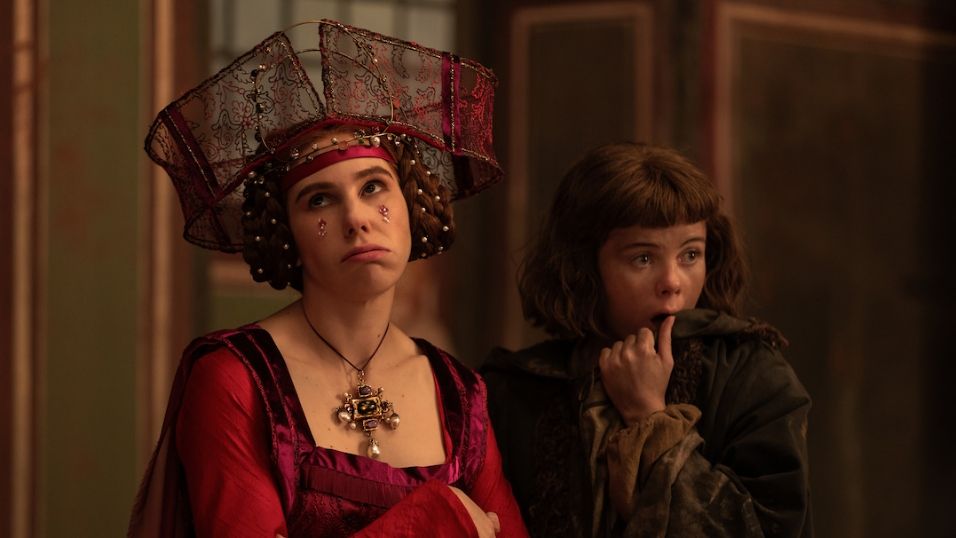 (L to R) Zosia Mamet as Pampinea and Saoirse-Monica Jackson as Misia wearing historical costumes.