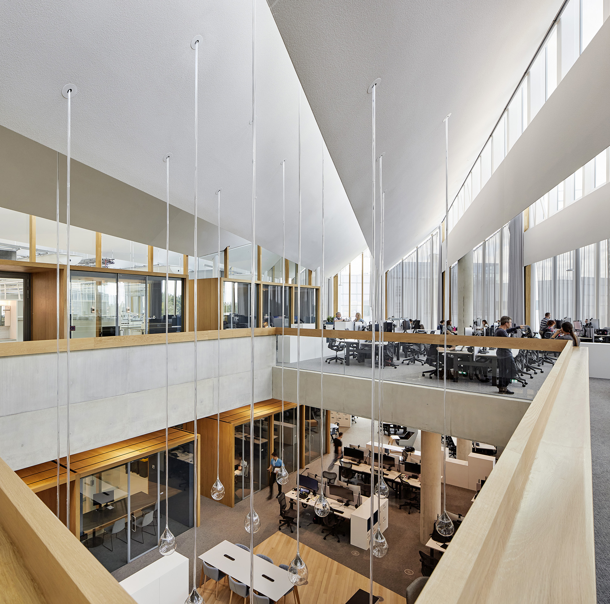 Inside a light modern looking building with large windows