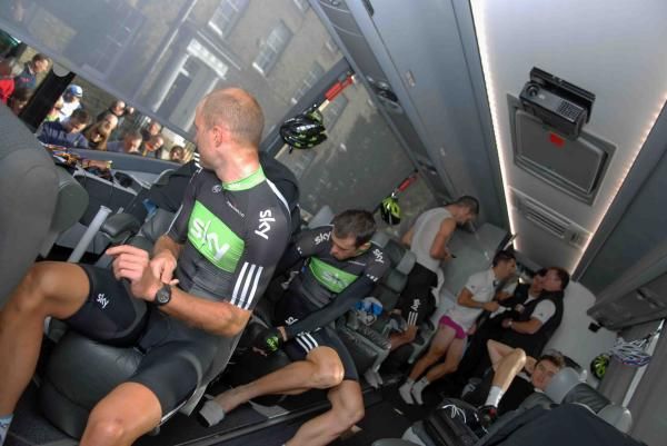 Riders prepare for the stage on the team bus