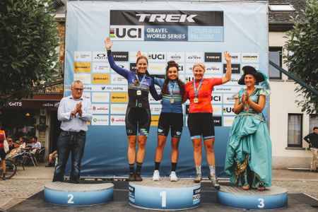Women's podium with Tessa Neefjes first, Stefania Dohrn second and Jade Treffeisen thirdat the Houffa Gravel race in Belgium, part of the 2022 UCI Gravel World Series