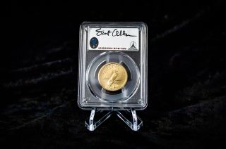 Each individually encapsulated coin in the Astronaut Memorial Foundation's set includes an autograph of an STS-125 crew member or the launch director.