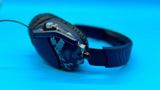 Turtle Beach Recon 70 gaming headset on a blue background