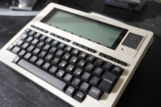 Darko Mesaros deploys Kubernetes using a TRS-80 Model 102 and a Raspberry Pi