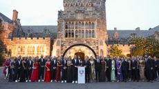 Team Europe golfers and wives and girlfriends pose for pictures at the 2025 Ryder Cup gala